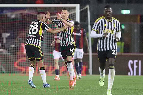Arkadiusz Milik celebrates scoring a goal
